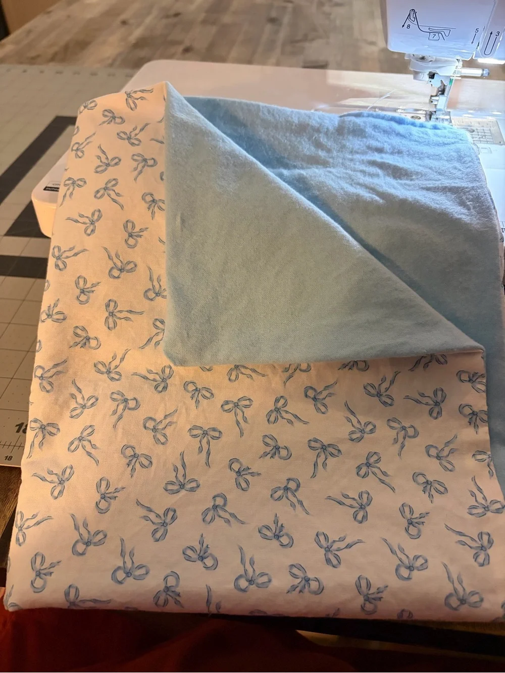 Soft Blue Bow Print baby swaddle blanket home made.